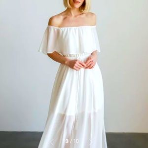 Off shoulder white maxi dress with defining waist. Brand new with tags.